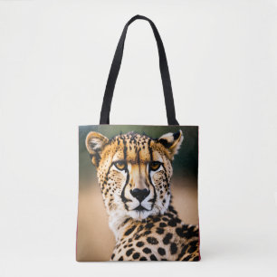 Speed and Grace: The Cheetah’s Gaze Tote Bag