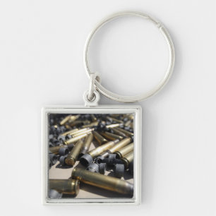 Spent brass and disintegrated links key ring