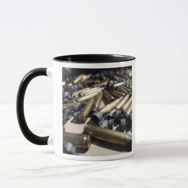 Spent brass and disintegrated links mug (Left)
