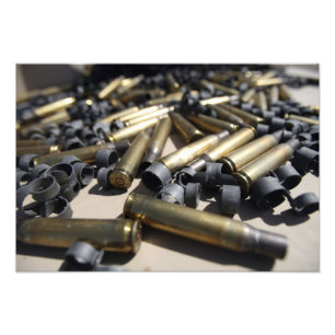 Spent brass and disintegrated links photo print