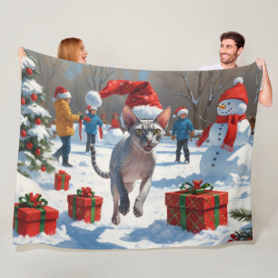 Sphynx Cat Running in Snow with Christmas Hat Fleece Blanket