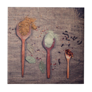 Spices on spoons ceramic tile