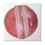 Spin Master's Sphere: A Fun Left Spin Cricket Ball Tile<br><div class="desc">"Spin Master's Sphere" – A Fun Left Spin Cricket Ball Design This "Spin Master's Sphere" design showcases the iconic red cricket ball, the very instrument wielded by skilled left-arm spin bowlers to weave their magical spells on the pitch. The close-up view highlights the worn texture and crucial stitching that allows...</div>