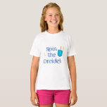 Spin The Dreidel T-Shirt<br><div class="desc">Chanukah is the Jewish eight-day, wintertime “festival of lights, ” celebrated with a nightly menorah lighting, special prayers and fried foods. The Hebrew word Chanukah means “dedication, ” and is thus named because it celebrates the rededication of the Holy Temple (as you’ll read below). Also spelled Hanukkah (or variations of...</div>