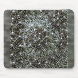 Spinning dandelion puff mouse pad