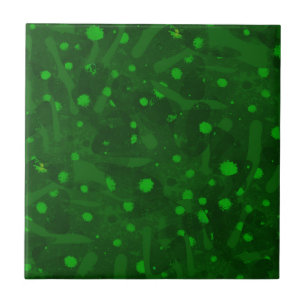Splashes of light green paint. ceramic tile