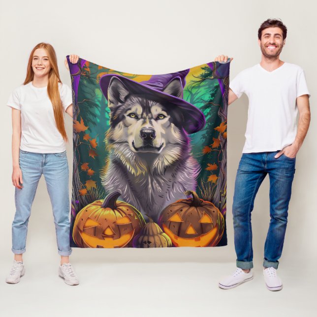 Spooky Alaskan Malamute alloween Witch and Pumpkin Fleece Blanket (In Situ)
