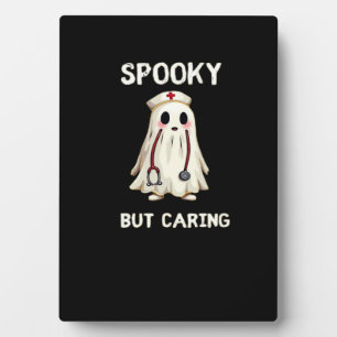 SPOOKY BUT CARING Essential T-Shirt Plaque