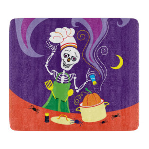 Spooky Chef Cooking a Pumpkin Cutting Board