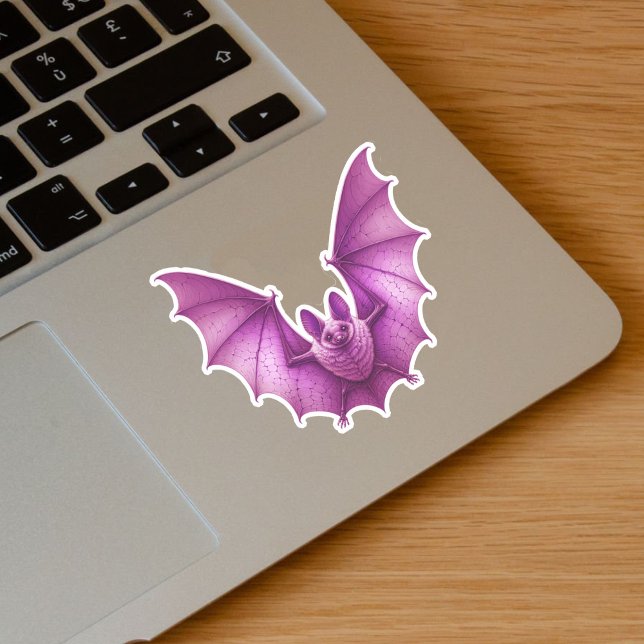Spooky Flying Pink Glowing Bat Wings Spread (Spooky flying glowing dark vibrant pink bat on vinyl sticker for Halloween.)
