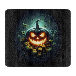 Spooky nature glowing Halloween pumpkin Cutting Board