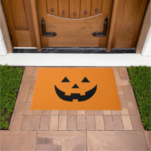 Spooky orange Jack o lantern pumpkin fun Halloween Doormat