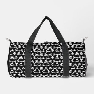 spooky skull on a black background duffle bag