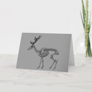 Spooky vintage skeleton reindeer drawing holiday card