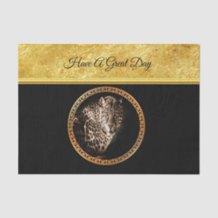Spotted leopard looking at you with gold foil tissue paper