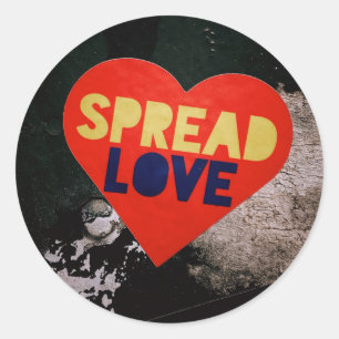 Spread Love Heart Sticker on Grunge Wall