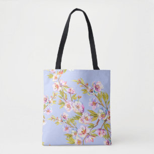 Sprigs of flowering apple or cherry trees on the b tote bag