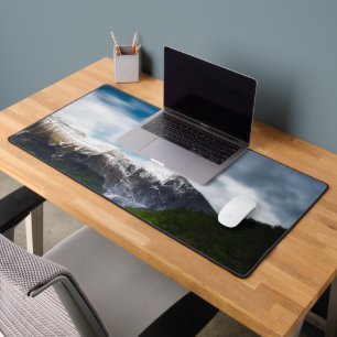 Spring flower field under mountain Krn Desk Mat