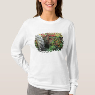 Spring flowers adorn an old tractor. T-Shirt