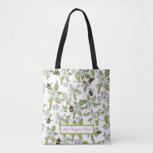 Spring garden blooms and bumblebees tote bag