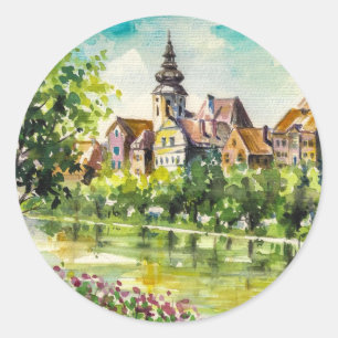 Spring in small city on the river classic round sticker