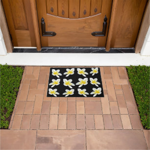 Spring Serenade: Yellow Frangipanis On Black, Doormat