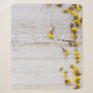 Spring yellow flowers, white plank decor. sherpa blanket