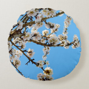 Spring's Embrace: White Blossoms Against Blue Sky Round Cushion