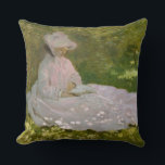 Springtime, Impressionist Portrait, Claude Monet Cushion<br><div class="desc">Claude Monet, 1872 oil on canvas impressionist oil painting portrait depicting the artist's wife, seated on the grass under the shade of lilac trees, wearing a pale pink dress and bonnet and reading a book, in the garden of the couples house in Argenteuil France stately sophisticated elegant fancy eclectic chic...</div>