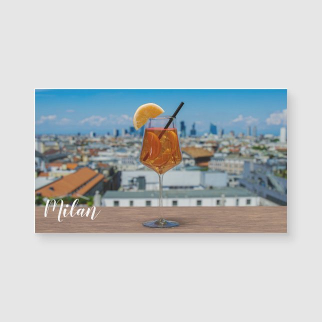 Spritz cocktail on a table with view of Milan (Front)