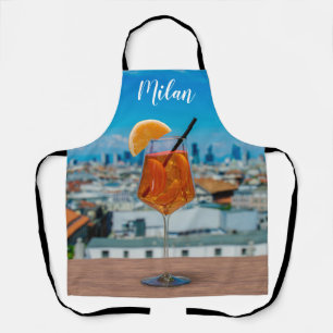 Spritz cocktail on a table with view of Milan Apron