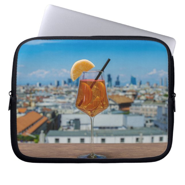 Spritz cocktail on a table with view of Milan Laptop Sleeve (Front)
