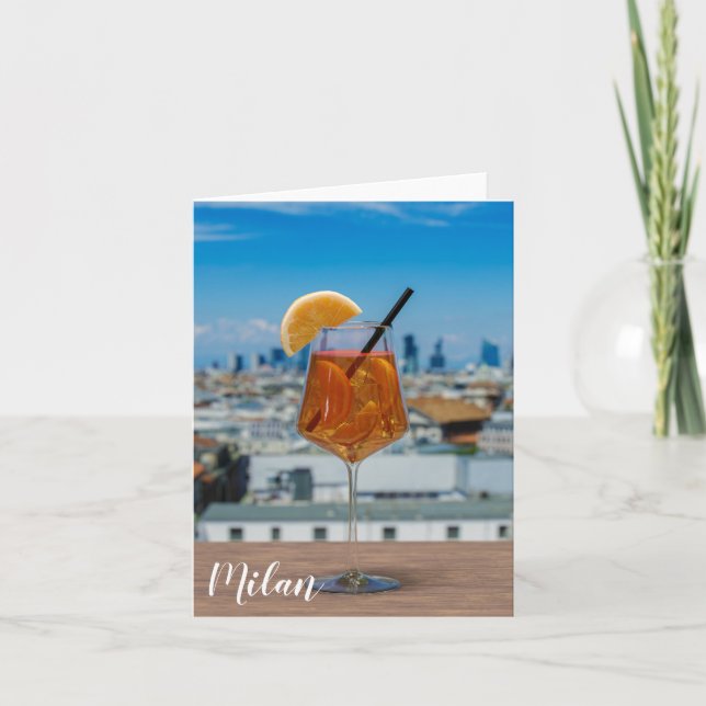 Spritz cocktail on a table with view of Milan Note Card (Front)