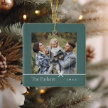 Spruce Green | Minimalist Bow Double Sided Photo Ceramic Ornament<br><div class="desc">Sweet and simple Christmas photo ornament features a minimalist layout,  with your family name and the year in clean,  classic serif typeface on a soft spruce green background. A petite bow beneath your photo completes the design. Add a second photo to the reverse side.</div>