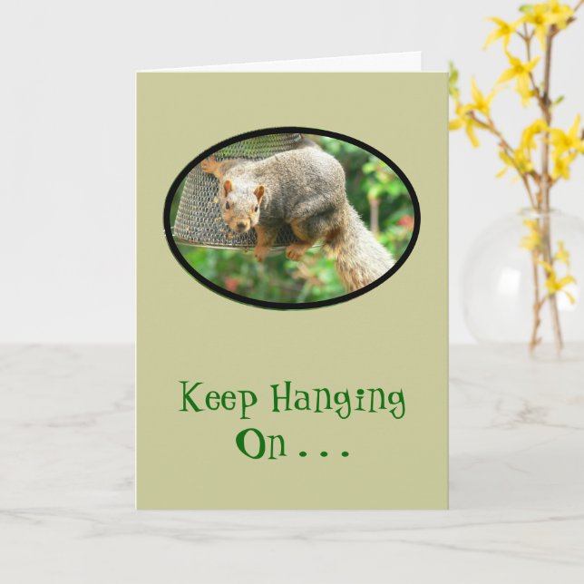 Squirrel Clinging to Birdfeeder, Keep Hanging On. Card (Yellow Flower)