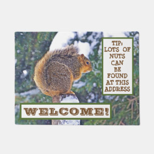 SQUIRREL ON SNOW-COVERED POST/LOOKING FOR NUTS? DOORMAT