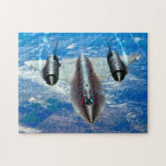 SR-71 BLACKBIRD (11x14 INCH) Jigsaw Puzzle<br><div class="desc">The SR-71 Blackbird is a long-range, high-altitude, Mach 3 strategic reconnaissance aircraft. During aerial reconnaissance missions, the SR-71 operated at high speeds and altitudes (85, 000 feet) to allow it to outrace threats. If a surface-to-air missile launch was detected, the standard evasive action was simply to accelerate and outfly the...</div>