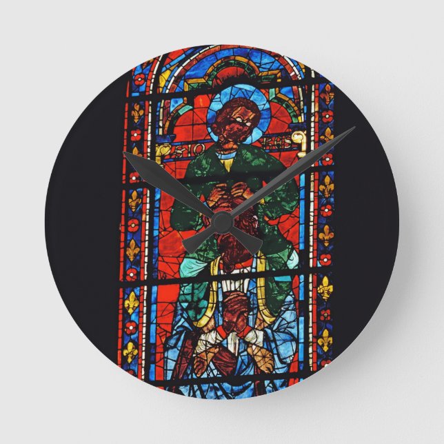 St. John the Evangelist riding the shoulders of Ez Round Clock (Front)