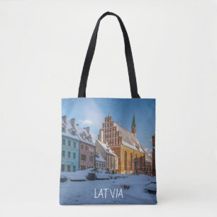 St. Peter's Church in winter in Riga, Latvia Tote Bag