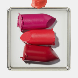 Stack of broken lipstick metal tree decoration