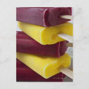 Stack of frozen ice pops, ice cream on a stick postcard