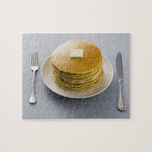 Stack of pancakes with butter on a plate jigsaw puzzle