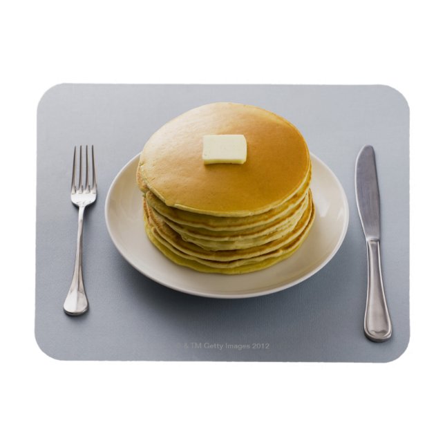 Stack of pancakes with butter on a plate magnet (Horizontal)