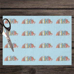 Stacks of Colourful Books on Light Blue Readers Tissue Paper