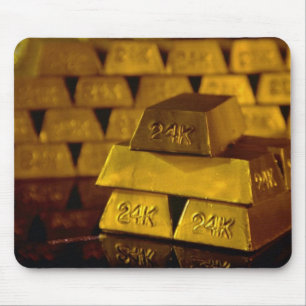 Stacks of gold bars mouse pad