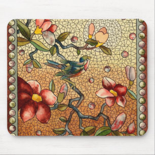 Stained glass style bird on a flowering tree mouse pad