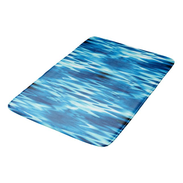 Stained gradient blue forming abstract whirlpool t bath mat (Angled)