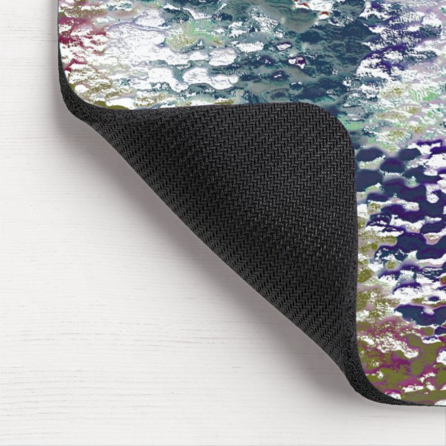 Stains and splatters of paint under hammered glass mouse pad (Corner)