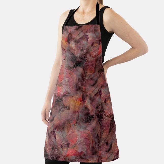 Stains in red hues on black grey grainy background apron (Insitu)