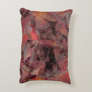 Stains in red hues on black grey grainy background decorative cushion
